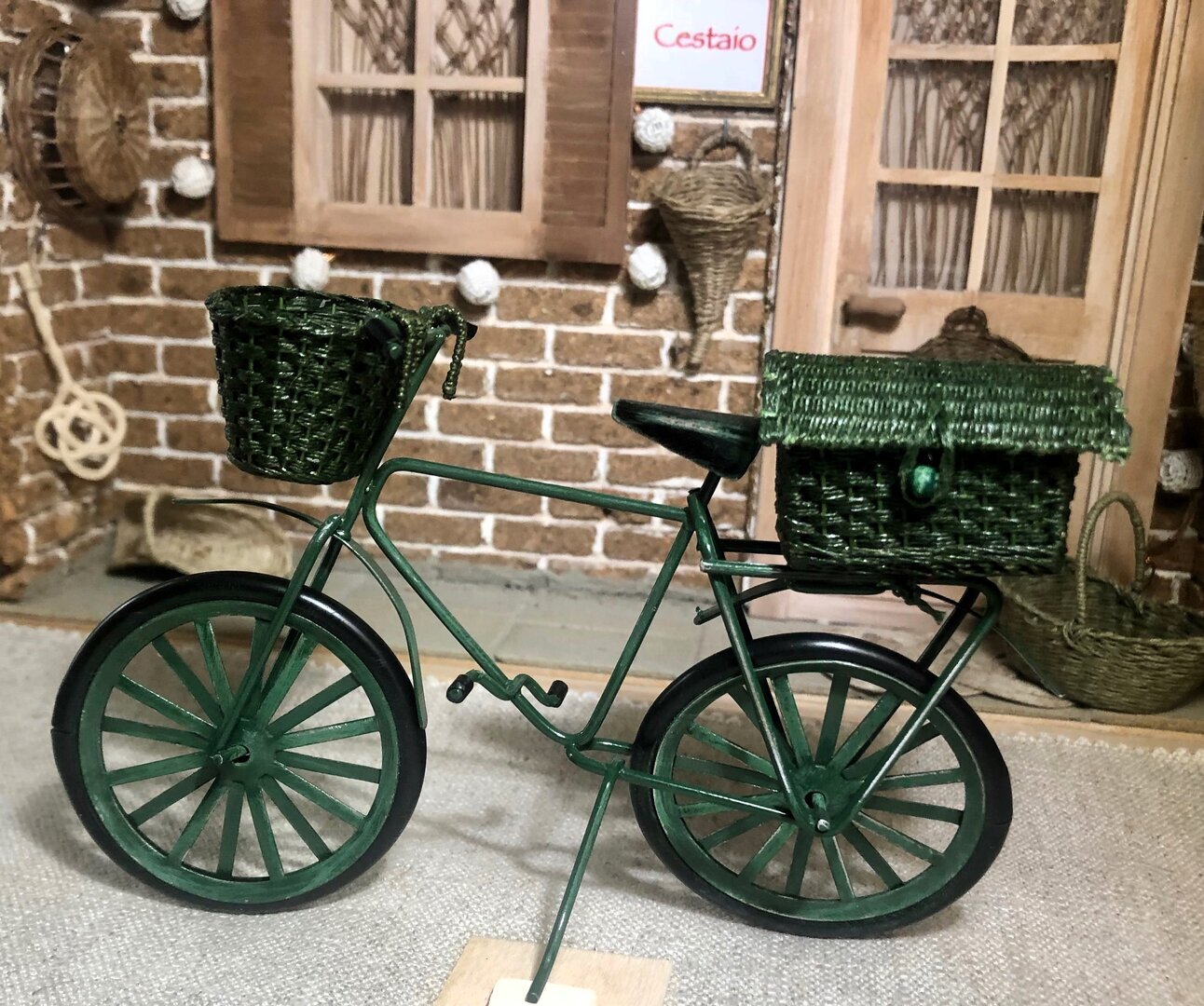 Green bicycle with baskets